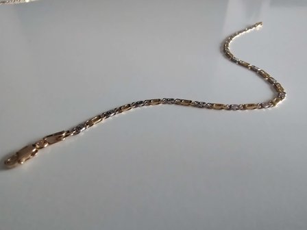 Gouden armbanden juwelier Vanhoutteghem