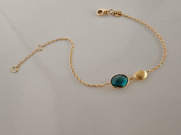 Goudne armband topaas 18 kt