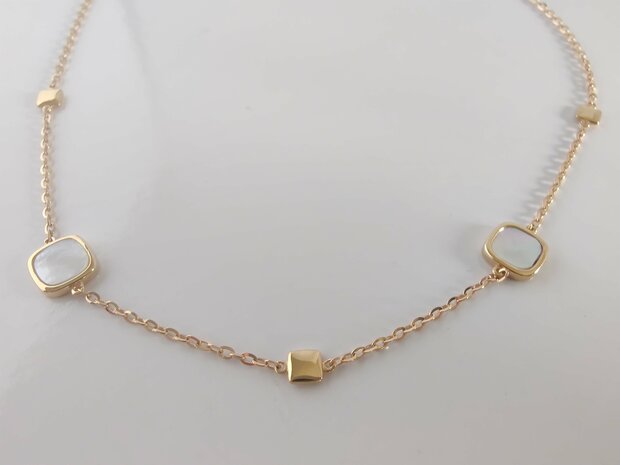 armband goud en parelmoer